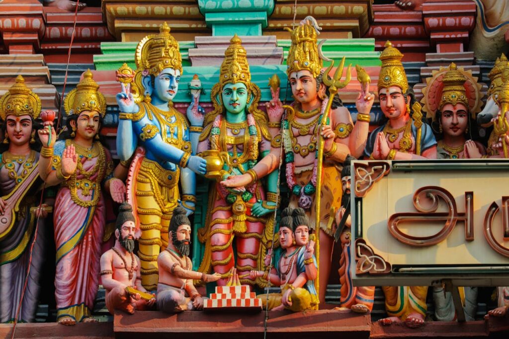 pexels photo 6667280 Detailed Hindu god sculptures adorn a temple in Chennai, showcasing rich cultural and religious artistry.
