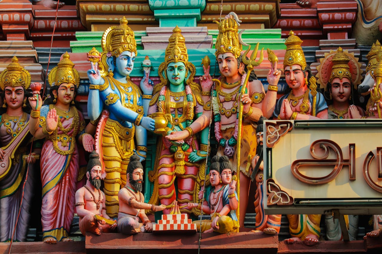 services-img Detailed Hindu god sculptures adorn a temple in Chennai, showcasing rich cultural and religious artistry.